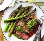 Rib eye steaks with asparagus and pistachio butter